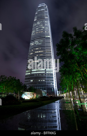 An atmospheric night view of Hong Kong's Two International Finance Centre's (2 IFC) illuminated office tower. Stock Photo