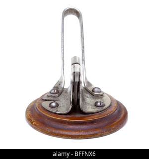 Worn art deco kitchen knife sharpener isolated against white background. Stock Photo