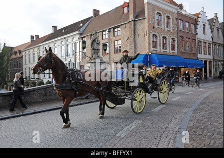 Horse drawn carriage Bruges in Belgium Europe Stock Photo