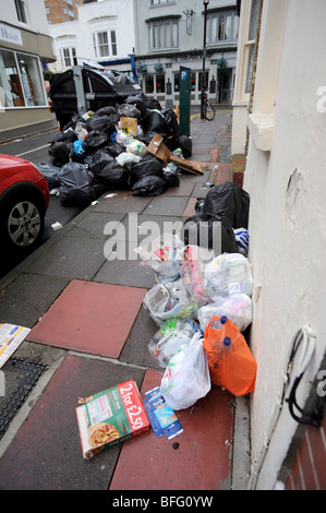 Overflowing communal bins in brighton after a strike by refuse workers about pay Stock Photo