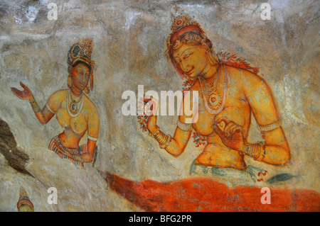 Sigriya wall paintings, Sri Lanka, mural of Asparas or female spirits at Sigriya Rock Fortress, Sri Lanka Stock Photo