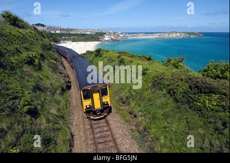 Train leaving St Ives near Porthminster beach in Cornwall,England,'Great Britain','United Kingdom',GB,UK,EU Stock Photo