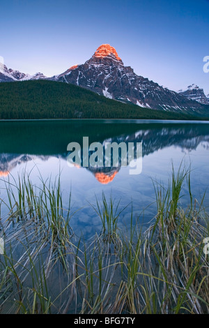 Mount Chephren is reflected in Water Fowl Lake along the Icefields Parkway in Banff National Park, Alberta, Canada Stock Photo