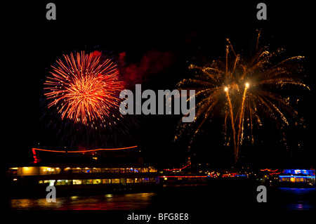 Cruise ships on Rhine river stopping for fireworks Rhein in Flammen near Bingen, Germany Stock Photo