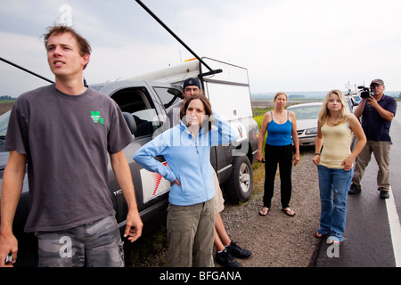 Storm chasers participating in Project Vortex 2 watch a developing supercell northwest Missouri, June 7, 2009. Stock Photo
