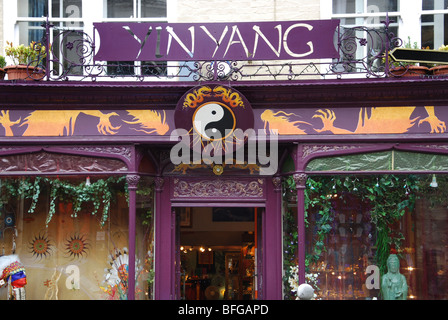 Colourful shop front in Glastonbury High Street Somerset England Stock Photo