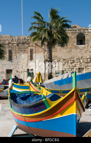 Colourful traditional fishing boat at Marsaxlokk Malta. Stock Photo