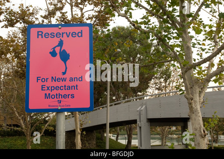 Reserved parking space for pregnant women and new mothers. Stock Photo