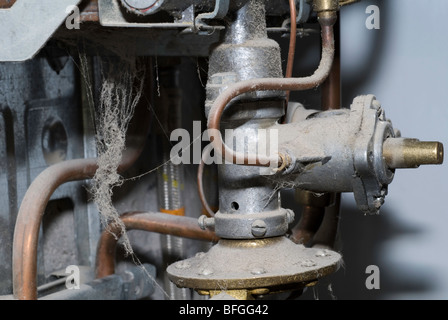 old dusty gas water heater, inside view Stock Photo