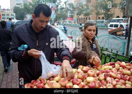 Uyghur people in the street markets of Urumqi, Xinjiang, CHINA Stock Photo