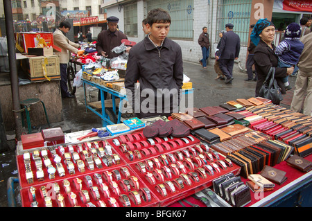 Uyghur people in the street markets of Urumqi, Xinjiang, CHINA Stock Photo