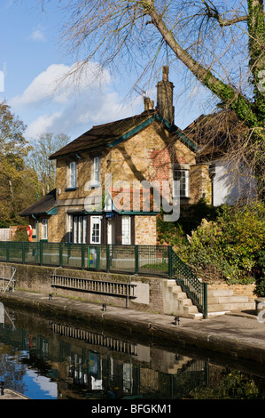 A traditional riverside lock keeper's cottage on Boulters Lock on the River Thames near Maidenhead Berkshire UK Stock Photo