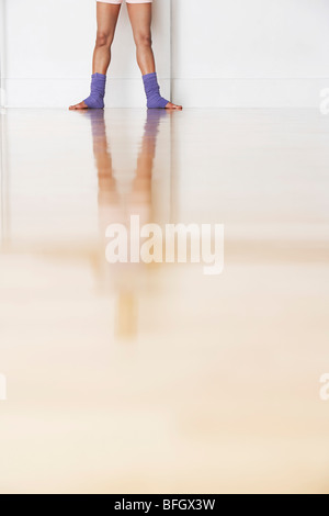 Ballet dancer and reflection, lower section Stock Photo