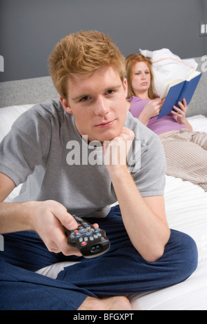 Couple Together in Bedroom Stock Photo