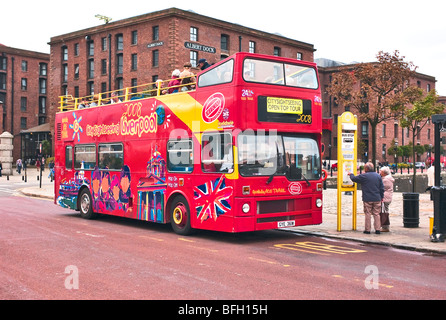 Open top sightseeing omnibus in Albert Dock Liverpool Lancashire England UK EU Stock Photo