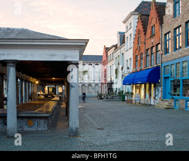 Morning view of the Fish Market (1821), in Vismarkt Square, Bruges, Belgium Stock Photo