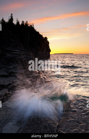 A view of the Indian Head at Indian Head Cove at sunset on the Georgian Bay side of the Bruce Peninsula, Ontario, Canada Stock Photo
