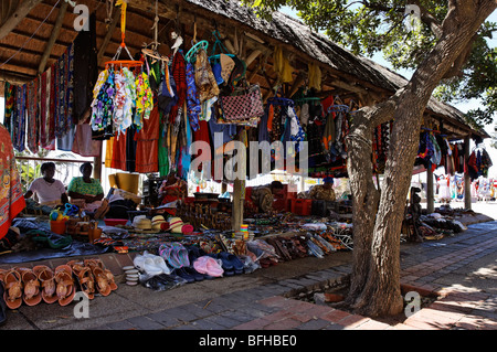 Colourful clothing and accessories on sale at tourist market in Durban, Kwazulu Natal, South Africa. Stock Photo