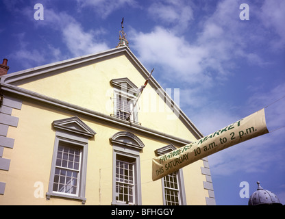 UK, Wales, Brecon, High Street, farmers market banner outside Market Hall building Stock Photo