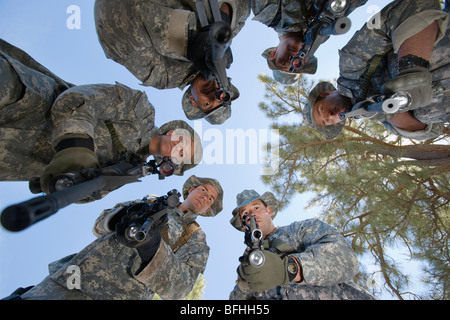 Low angle portrait of armed soldiers Stock Photo