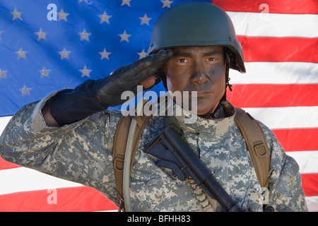 Portrait of US Army soldier saluting Stock Photo