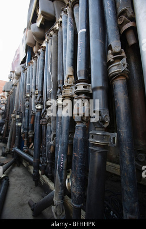 Row of car parts in junkyard Stock Photo