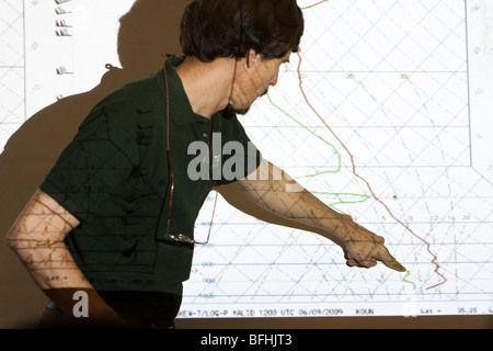 Doctor Eric Rasmussen points at a weather forcast map in Wichita, Kansas, USA, June 9, 2009 Stock Photo