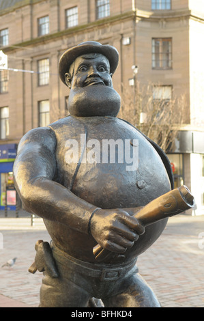 A bronze Statue of 'Desperate Dan' in the centre of Dundee city. Stock Photo