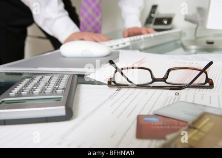 Businessman Working at Desk Stock Photo