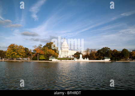 Capitol building Washington DC; The Capitol building seen across the reflecting pool in autumn, National Mall, Washington DC, USA Stock Photo