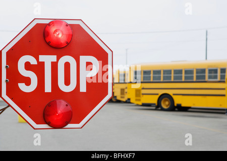 Stop Sign on School Bus Stock Photo