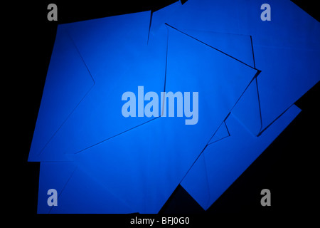 closed envelopes with blue spot light on black background Stock Photo
