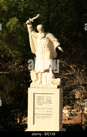 Israel, Mount Carmel. The statue of Prophet Elijah at the courtyard of the Carmelite Sanctuary and Convent at the Muhraka Stock Photo