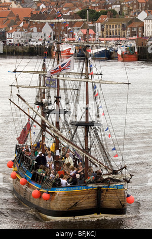 A replica of Captain James Cook's HMS Endeavour moored in Whitby ...