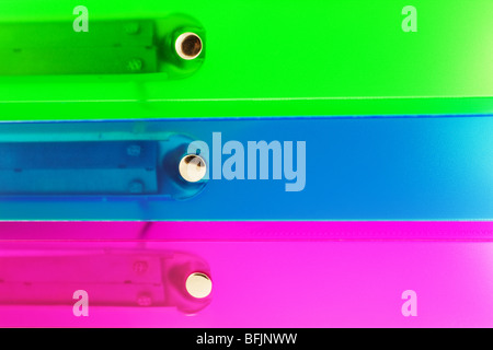 three multicolored folders. closeup Stock Photo