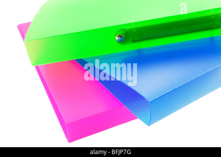 three multicolored folders on white background Stock Photo