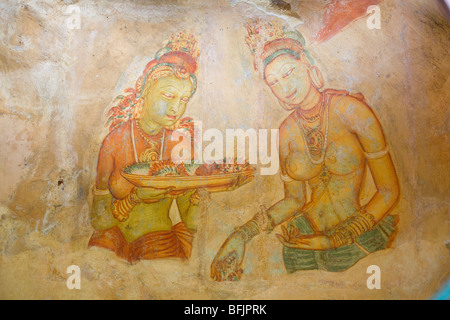 Rock paintings of concubines inside Sigiriya, Sri Lanka Stock Photo