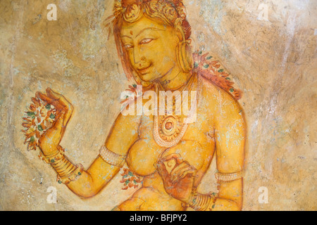 Rock paintings of concubines inside Sigiriya, Sri Lanka Stock Photo