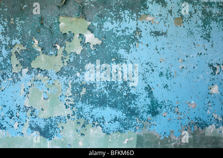 The old blue weathered dirty concrete wall background Stock Photo