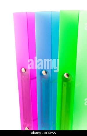 three multicolored folders on white background Stock Photo