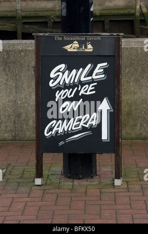Sign - Smile You're on Camera Stock Photo