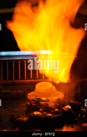 'Volcano fire' made of onion at Japanese Hibachi Grill restaurant Stock Photo