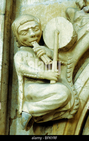 Beverley Minster, carved stone musician pipe pipes fife drum drums tabor tabors Medieval music musicians instrument instruments Stock Photo