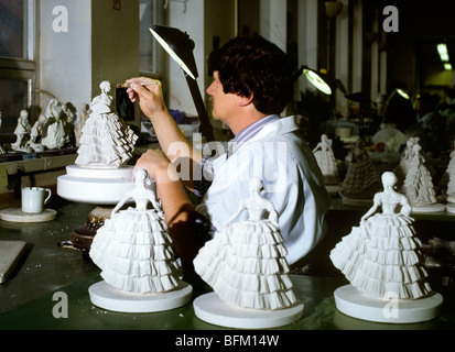 UK, England, Worcestershire, Royal Worcester factory worker assembling porcelain figurine Stock Photo