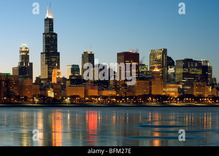 Downtown Chicago reflected in frozen Lake Michigan. Stock Photo