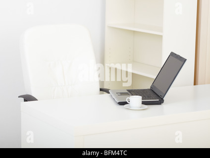 Office empty modern light workplace with the laptop Stock Photo