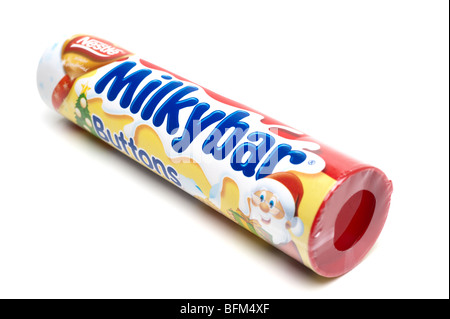 Cardboard tube of Milkybar "white chocolate" button sweets Stock Photo