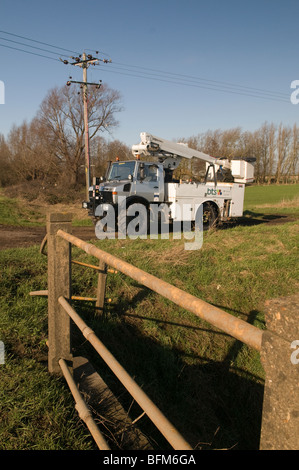 Mercedes Unimog U1200 utility vehicle with simon hoist on the fens near Ely Stock Photo