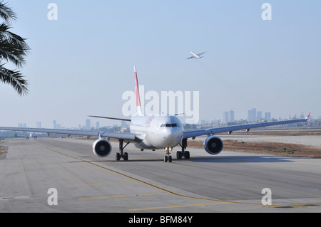 Israel, Ben-Gurion international Airport SWISS passenger jet ready for takeoff Stock Photo