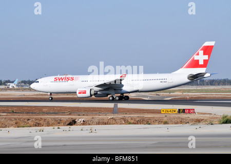 Israel, Ben-Gurion international Airport SWISS passenger jet ready for takeoff Stock Photo